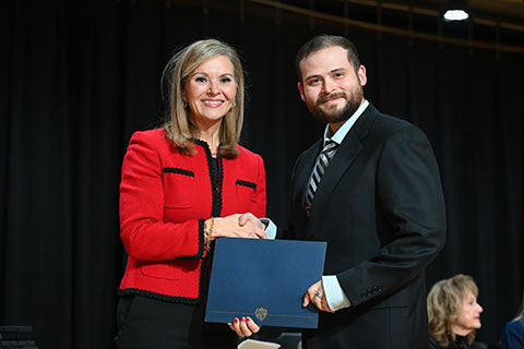 Dean Tricia Gatlin with an award winner.