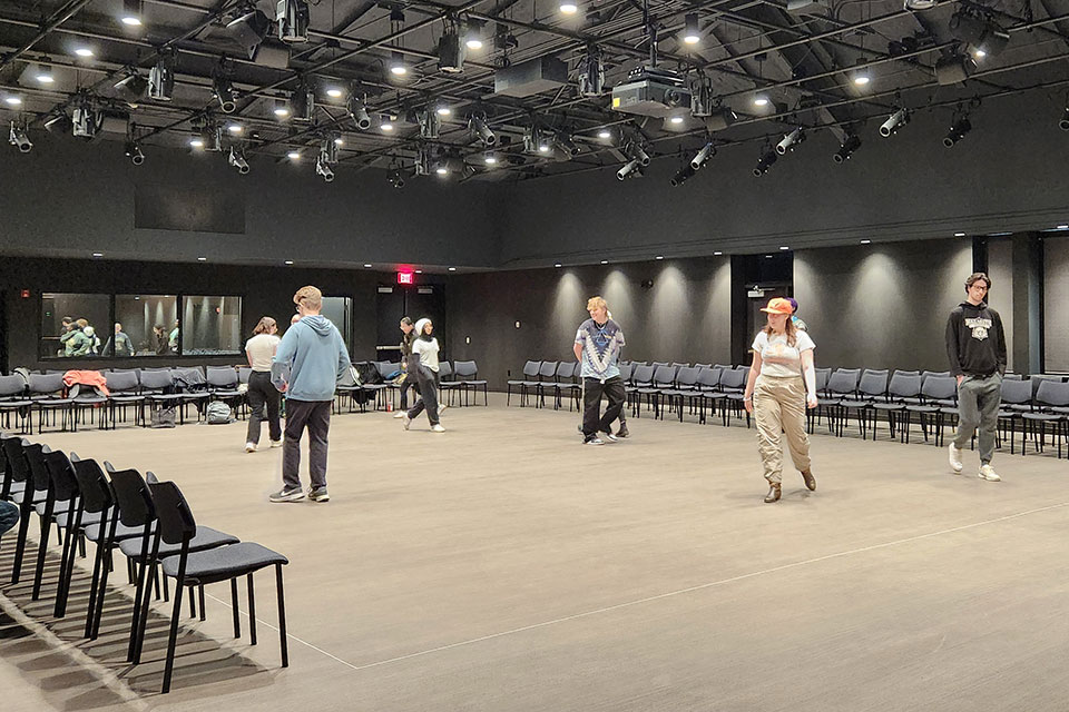 Students participate in an acting workshop in the new Blackbox Theater.