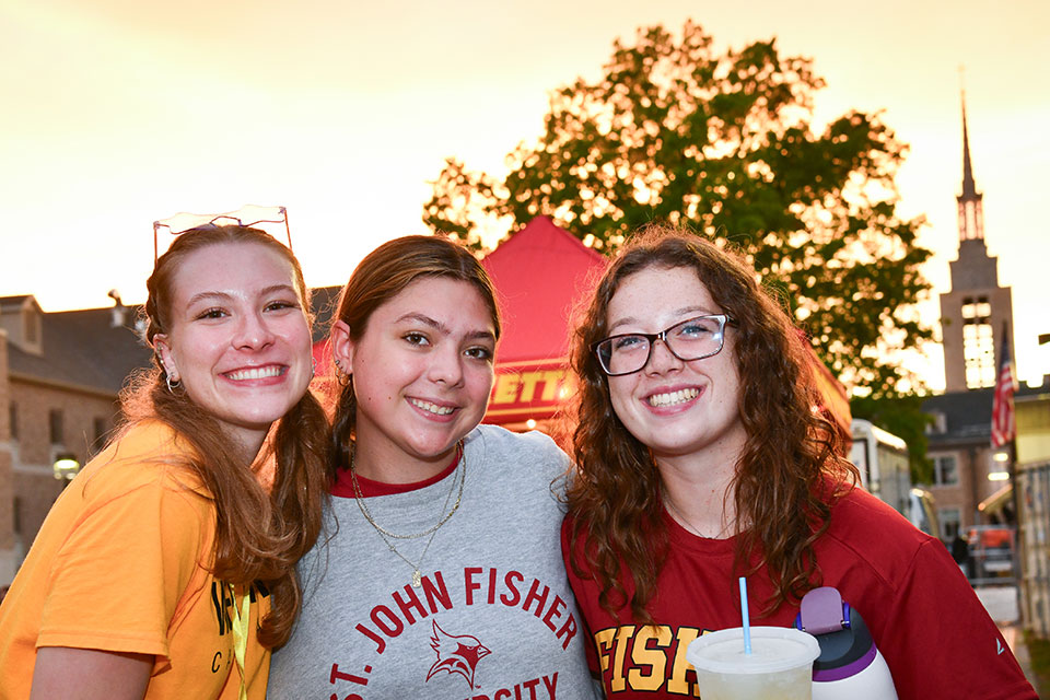 Three Fisher students outside of Kearney Hall.