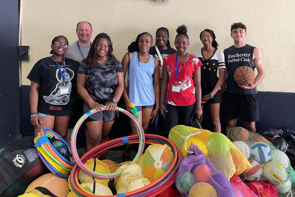 Kessan VanGronigen with fellow camp counselors and campers at JASY.