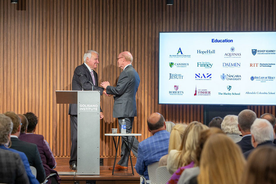 Thomas Golisano and President Gerard J. Rooney at the announcement.