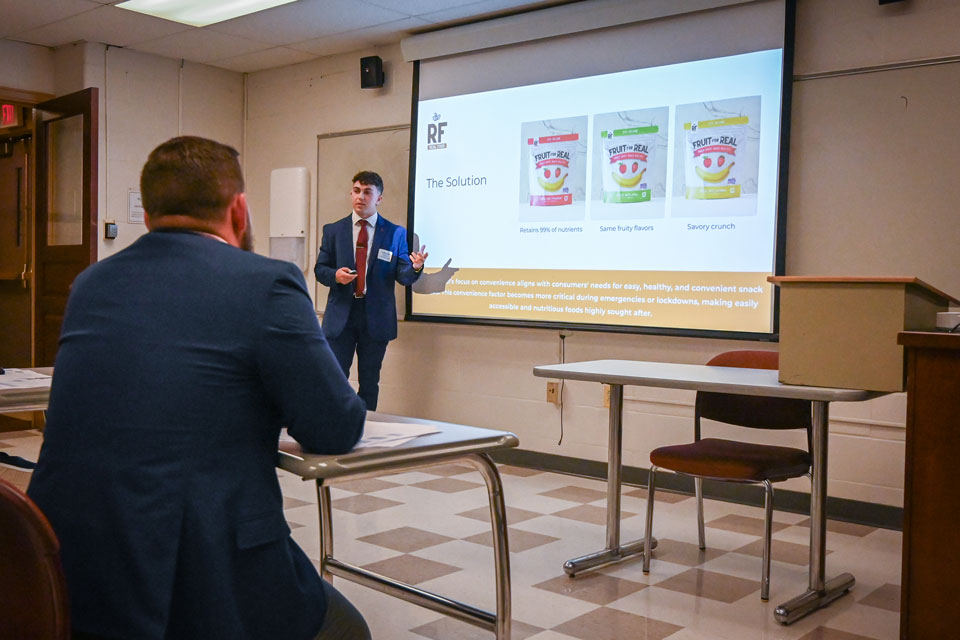 A student makes a business pitch during the 2024 spring Entrepreneurship Week.