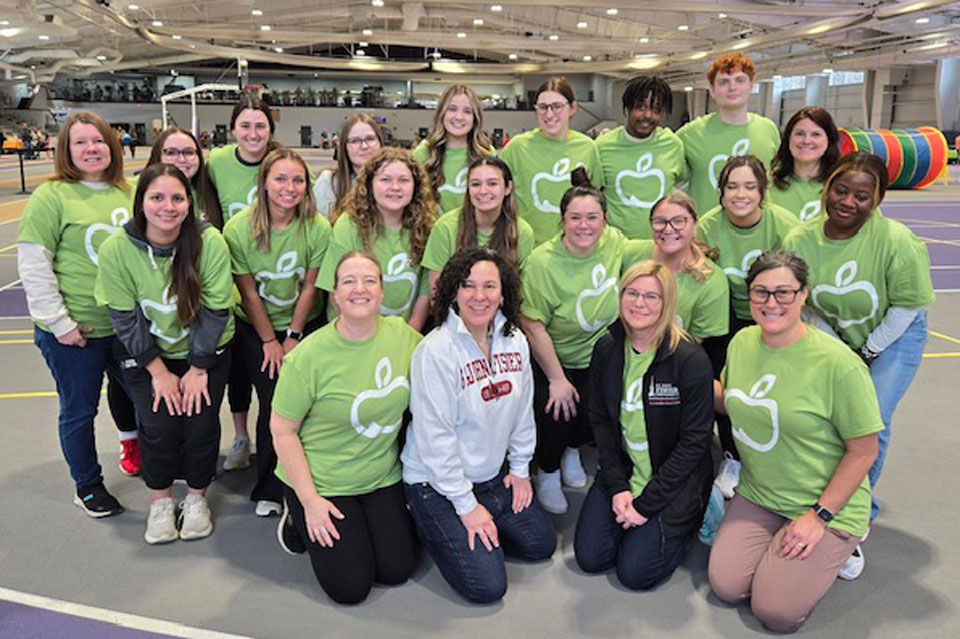 Members of the Wegmans School of Nursing and Golisano Institute for Intellectual and Developmental Disability Nursing volunteer at a Special Olympics event.