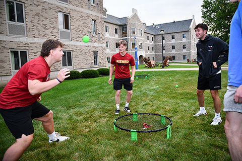 Students play spike ball during Welcome Weekend.